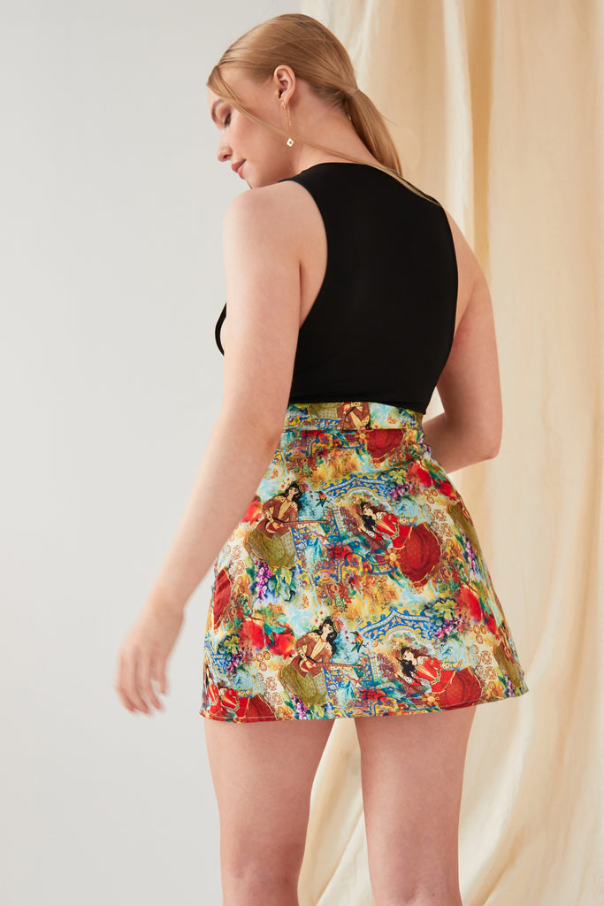 the back of a woman wearing a Sarvin Printed Mini Skirt.