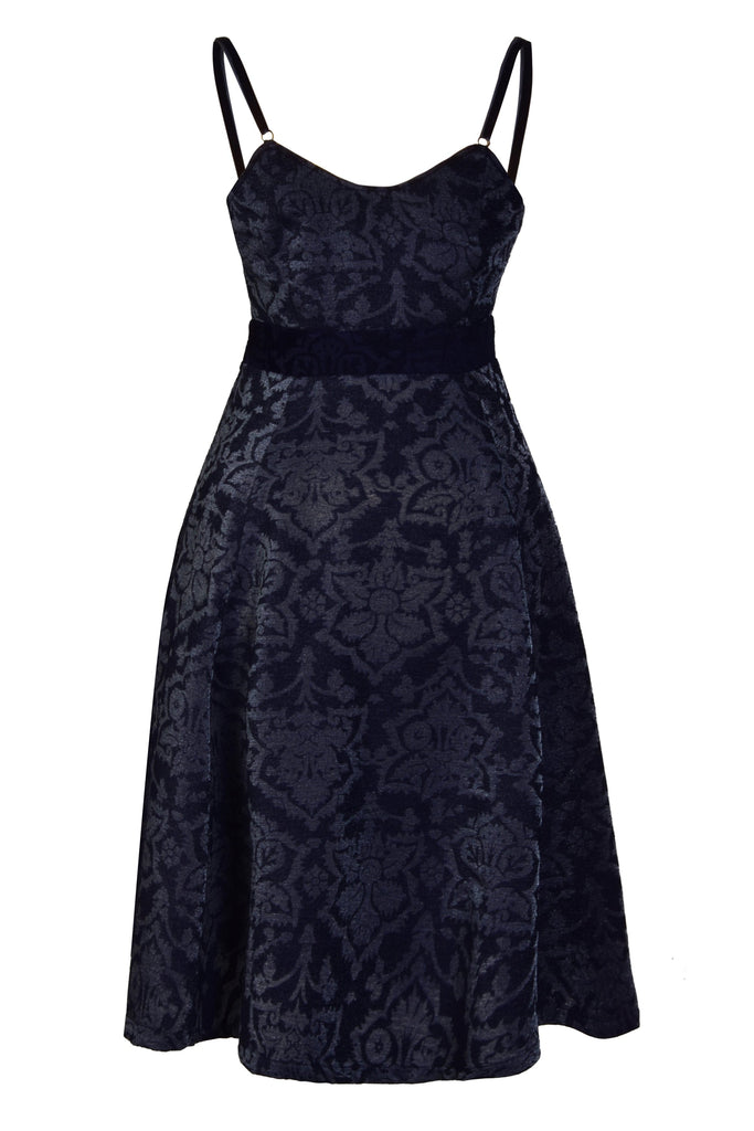 a Jacquard Fit And Flare Dress by Sarvin with a floral pattern on it.