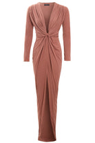 The Sarvin Rose Gold Twist Knot Front Dress is a long-sleeved, floor-length gown with a deep V-neckline and sparkling accents—offering an elegant and alluring look.