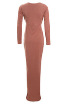 A long-sleeved, floor-length Sarvin Rose Gold Twist Knot Front Dress with a subtle shimmer is shown from the back, featuring a fitted silhouette and seam detail across the upper back.