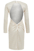 The Sarvin Ivory Lace Backless Dress is a beige, long-sleeved, bodycon evening dress with a lace-like texture, ruched lower back, and a large oval open back fastened at the neck with one button.