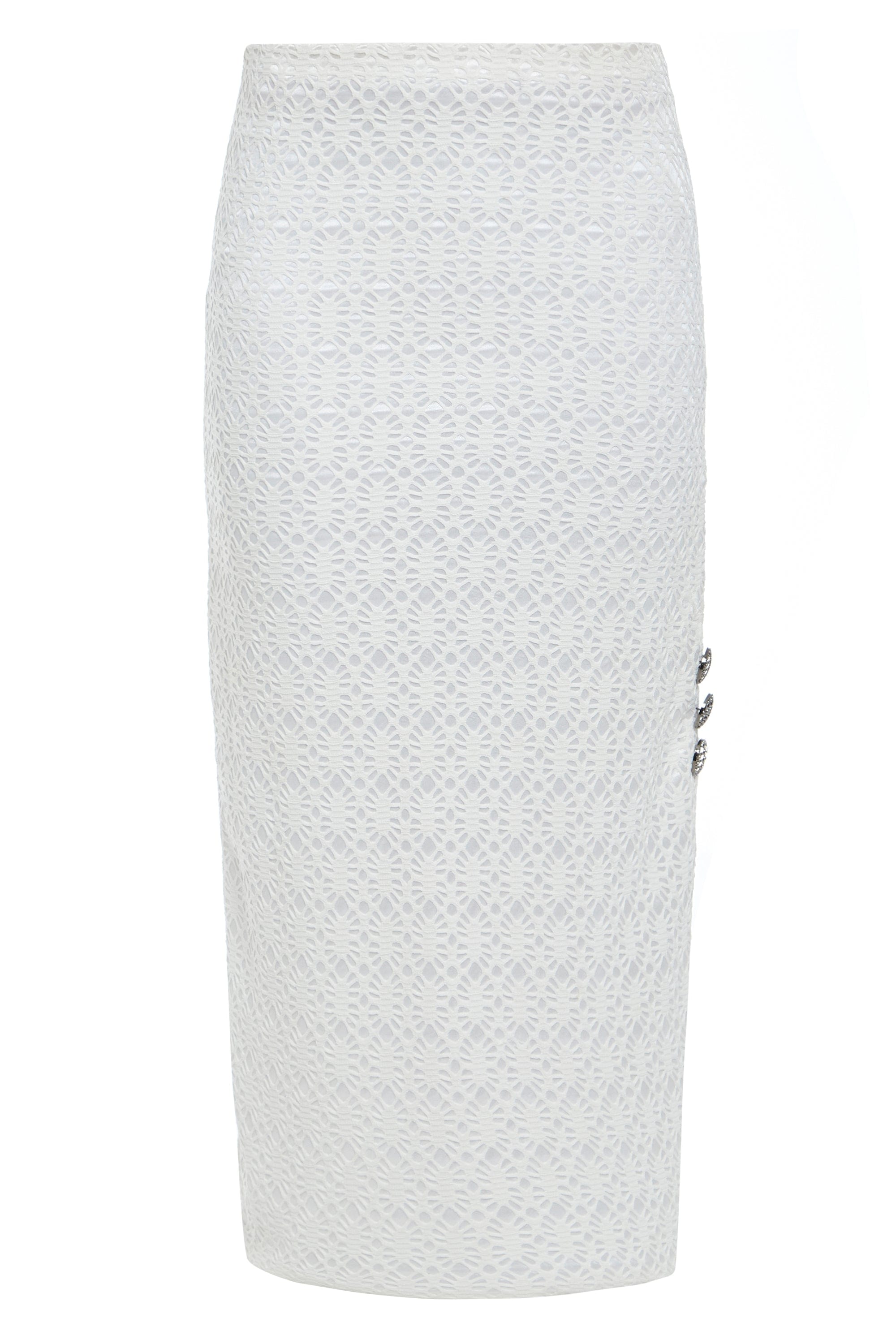 The Sarvin White Bodycon Lace Skirt is a high-waisted, knee-length skirt handmade in the UK, featuring a textured floral lace pattern and three decorative buttons on the right side.