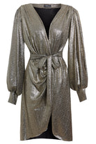 The Sarvin Long Sleeve Sequin Wrap Dress is a knee-length metallic silver evening dress featuring a deep V-neck, gathered waist with matching belt, draped front, subtle puffed sleeves, and shimmering textured fabric for a radiant look.
