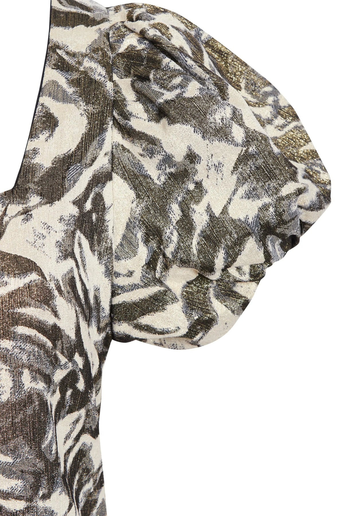 Close-up of the Sarvin Puff Shoulder Mini Dress, featuring voluminous short sleeves with gathered detailing in textured fabric. An abstract black, gold, and cream pattern evokes golden floral jacquard.