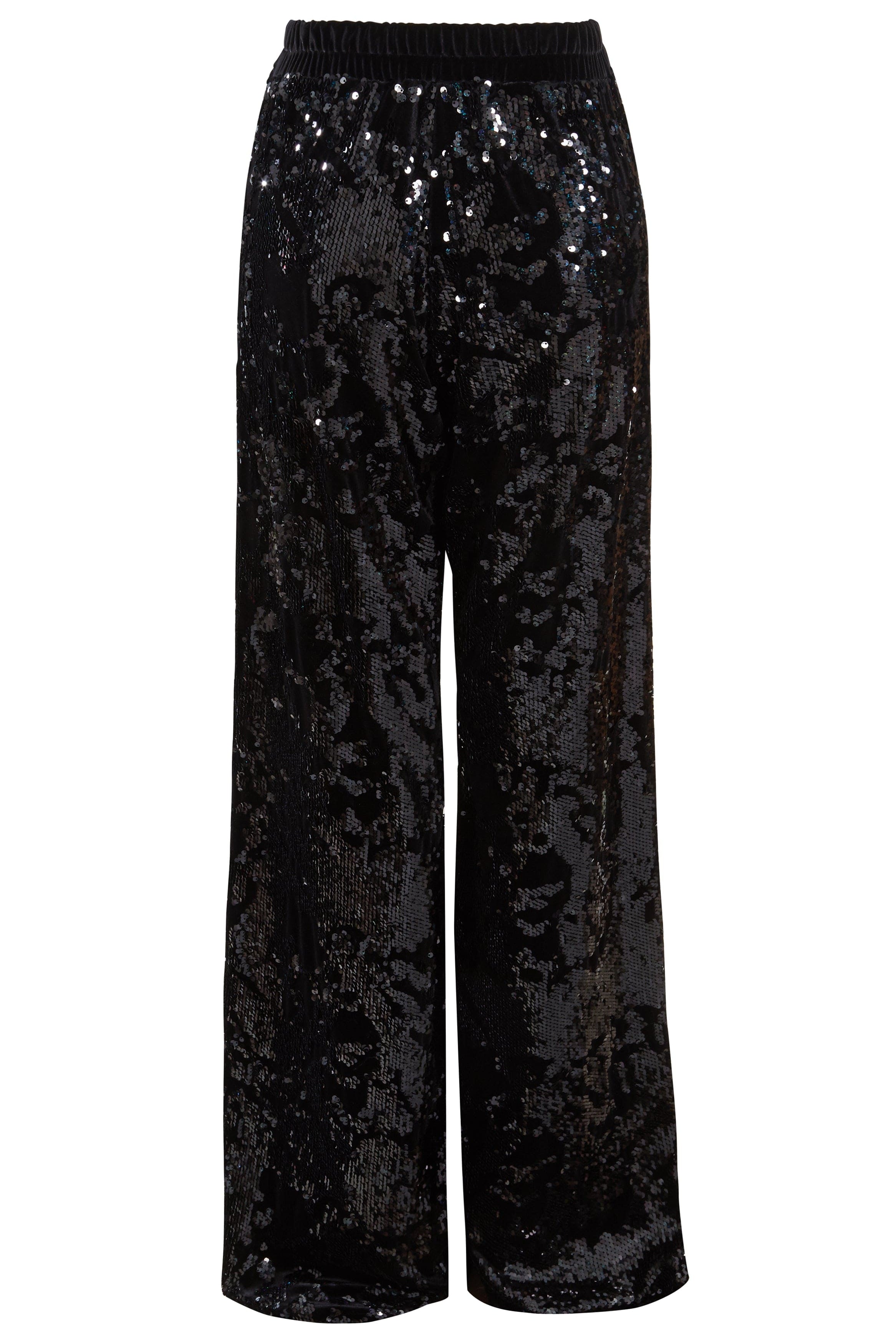 Sarvin’s Sequin Velvet Flared Trousers are black, handmade in the UK, and feature a relaxed fit with an elastic waistband. Covered in glossy sequins for a reflective look, they’re the perfect party piece.