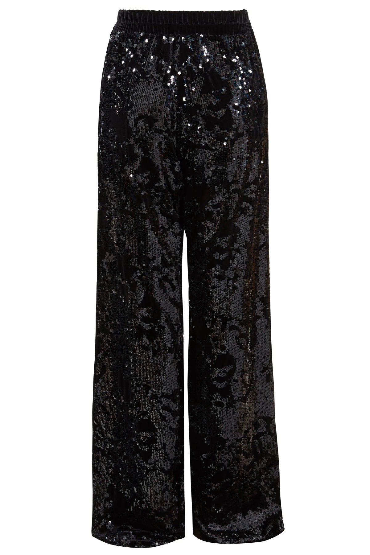 Sarvin’s Sequin Velvet Flared Trousers are black, handmade in the UK, and feature a relaxed fit with an elastic waistband. Covered in glossy sequins for a reflective look, they’re the perfect party piece.