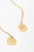 Sarvin's Flower Shape 18K Gold Drop Earrings, designed with rose-inspired shapes, are displayed elegantly on a white background.