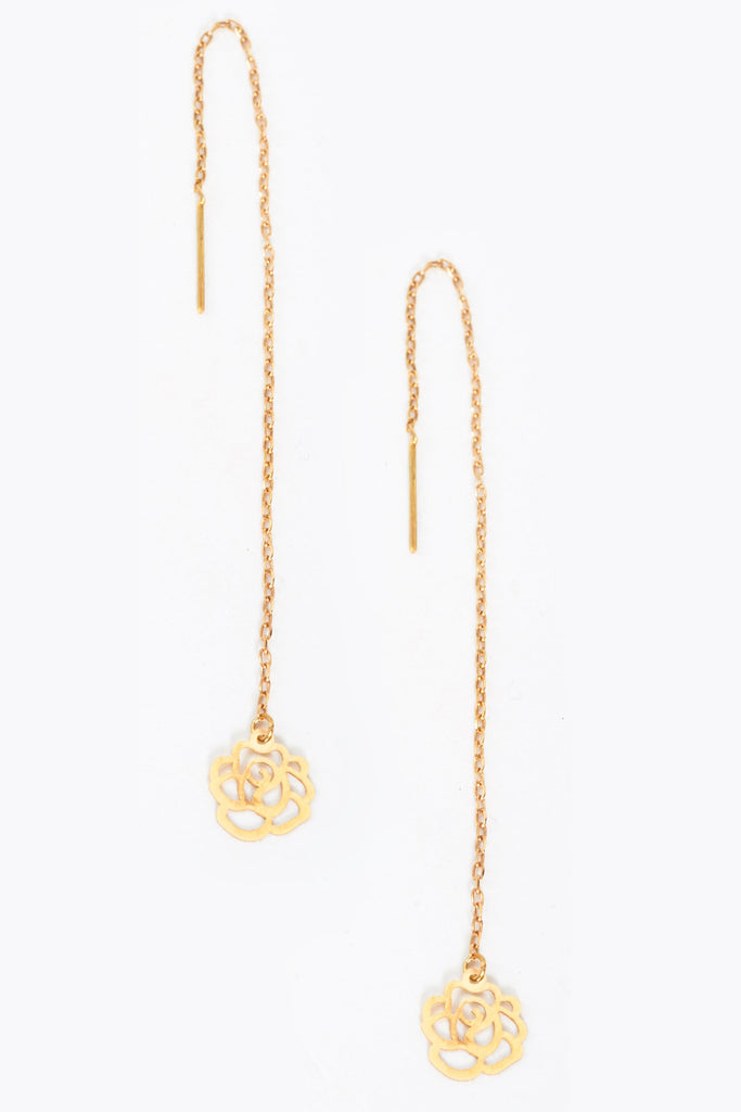 a pair of Sarvin Gold Threader Earrings with a flower on them.