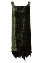The Sarvin Silk Velvet Feather Trim Dress is a sleeveless, forest green cocktail dress featuring a straight neckline and ostrich feather hem, shown against a white background.