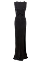 The Black Cut-Out Maxi Dress by Sarvin features a sleeveless design, high slit, and triangular waist cutout, crafted from sparkly fabric for a bold evening statement.