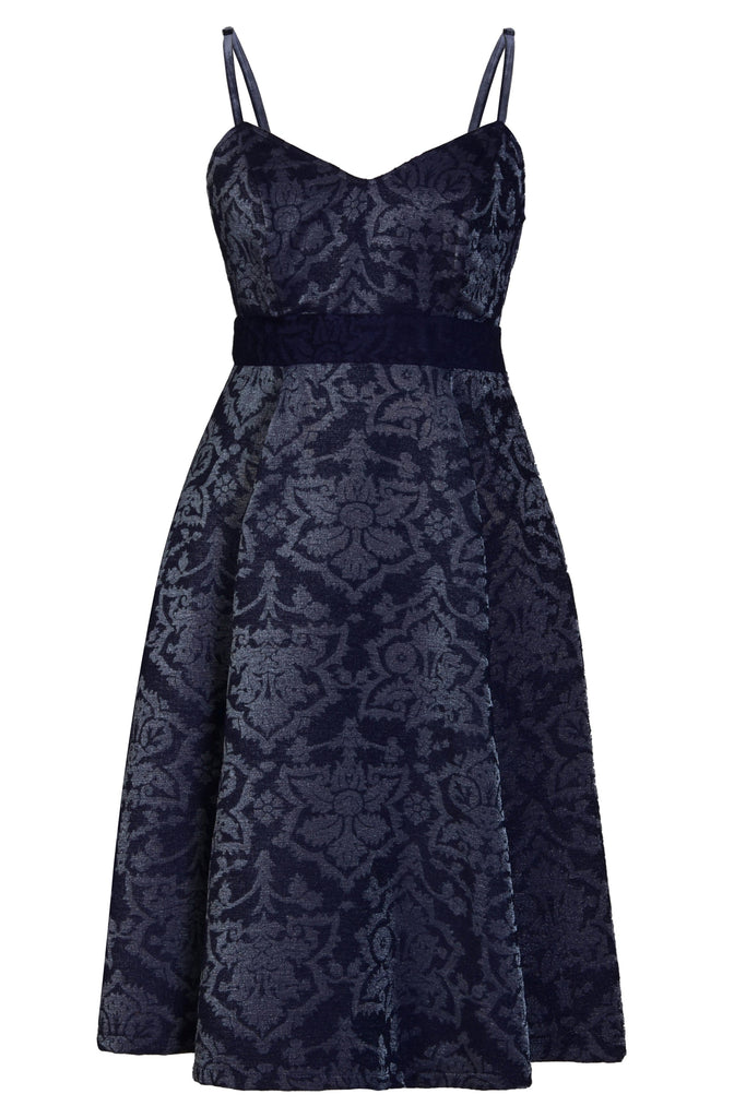 a Jacquard Fit And Flare Dress by Sarvin with a floral pattern.