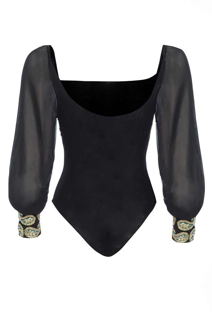 a Sarvin Black Mesh Bodysuit Long Sleeve with beading on the sleeves.