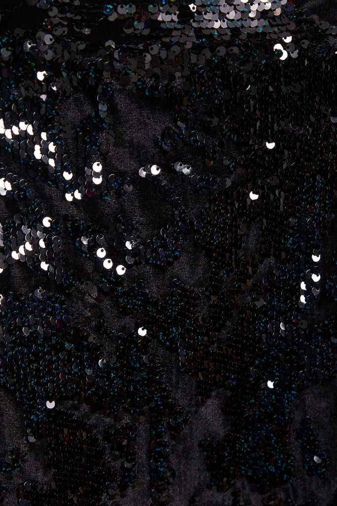 A close up image of a Sarvin Black Sequin Skirt fabric.