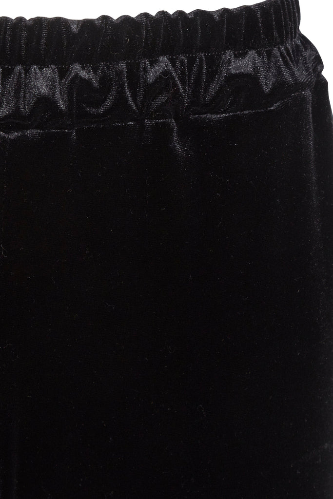 a close up of a Sarvin Wide Leg Velvet Trousers.