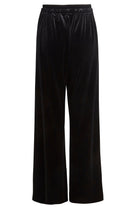 The back view of a woman's Sarvin Wide Leg Velvet Trousers.