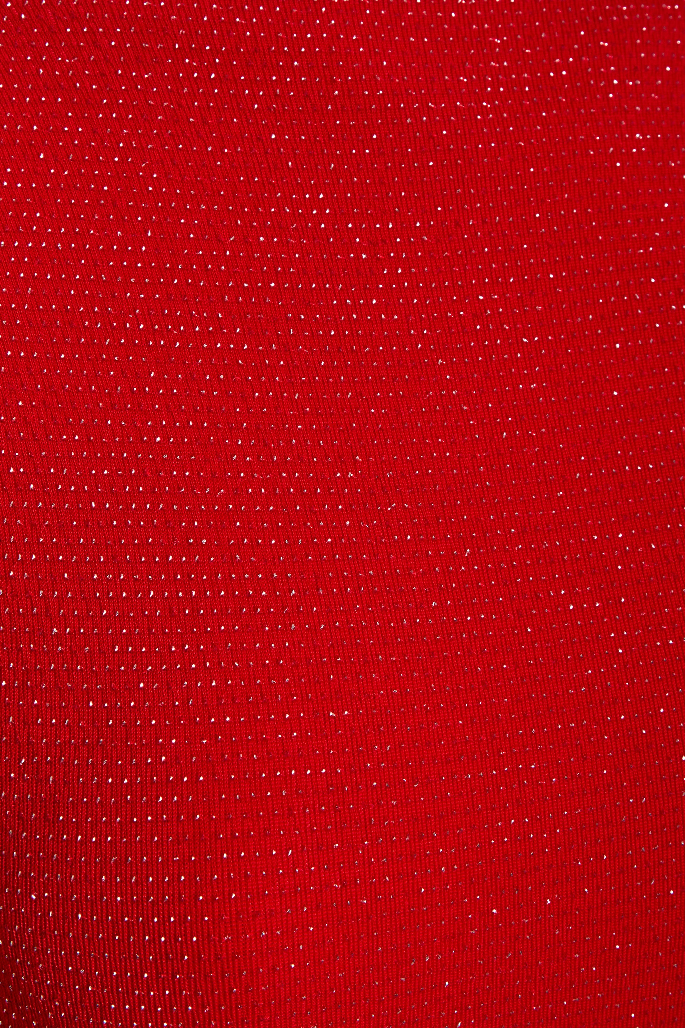 a close up of a Sarvin Red Cowl Back Gown.