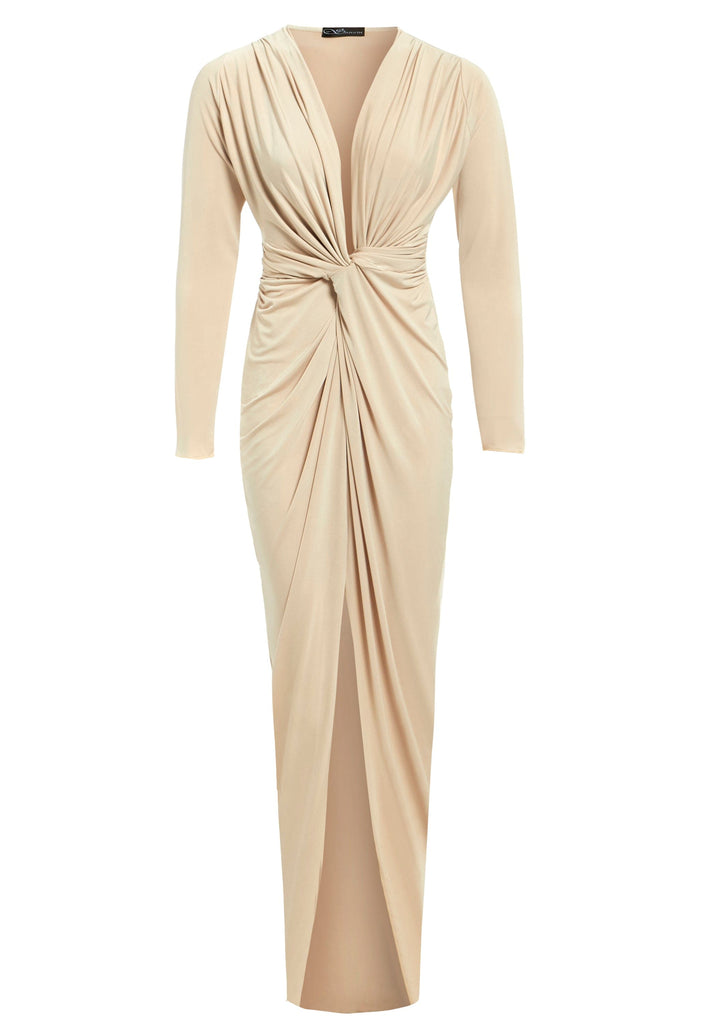 a beige long sleeved Sarvin dress with a slit.